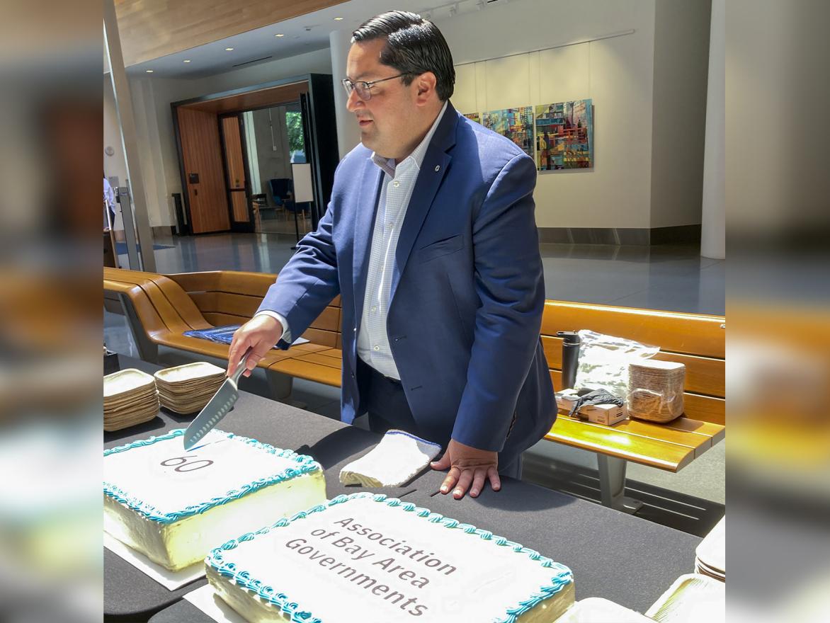 ABAG President Jesse Arreguin cutting the cake for the ABAG 60th Anniversary.