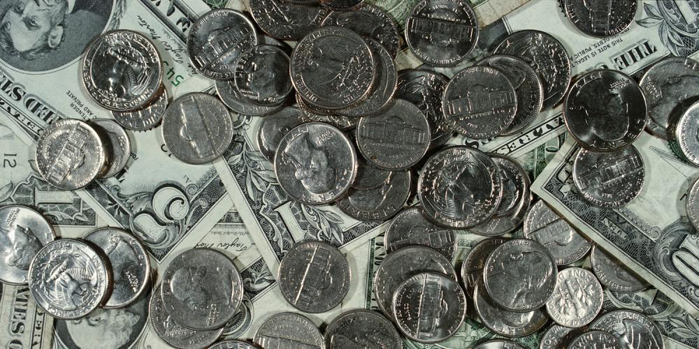 U.S. currency - dollar bills and coins.