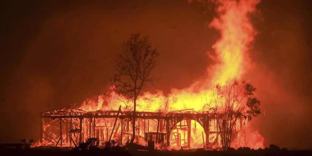 A building in Sonoma engulfed in flames.