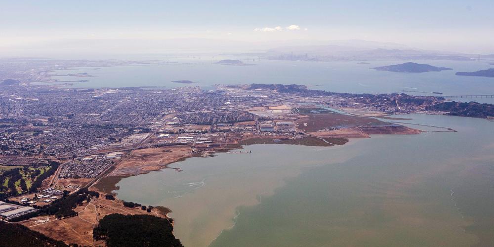 Aerial over the shoreline and Richmond, California.
