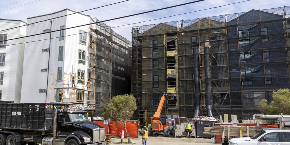 Construction of an affordable housing apartment building complex for teachers in San Francisco: Shirley Chisholm Village.