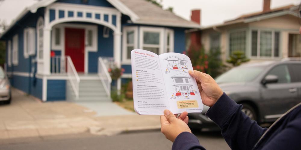 person using an Earthquake Field Guide to assess seismic vulnerability of a residence